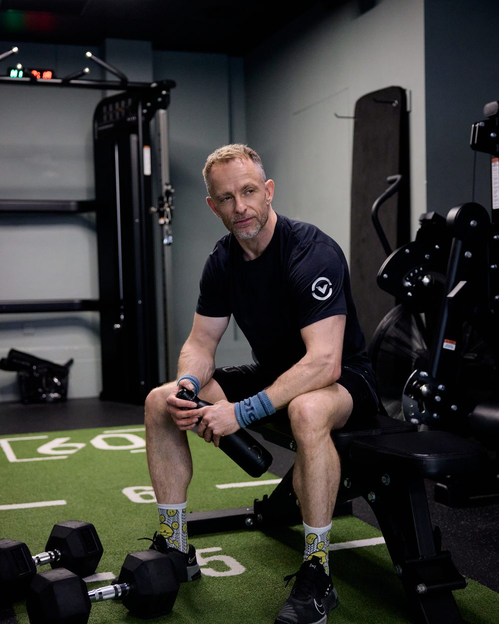 Gavin Cooper sitting on a bench in a CrossFit gym, Bristol, 2026